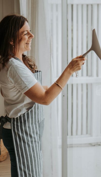 staff cleaning windows